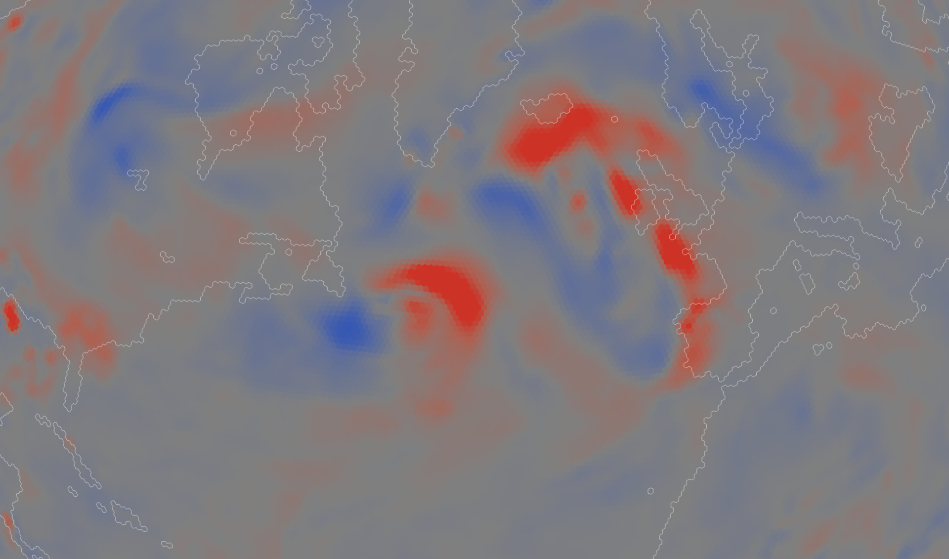 Rising and sinking air at 500 hPa over the North Atlantic, red where the fronts of a storm south of Greenland lift the air and blue where it sinks behind them